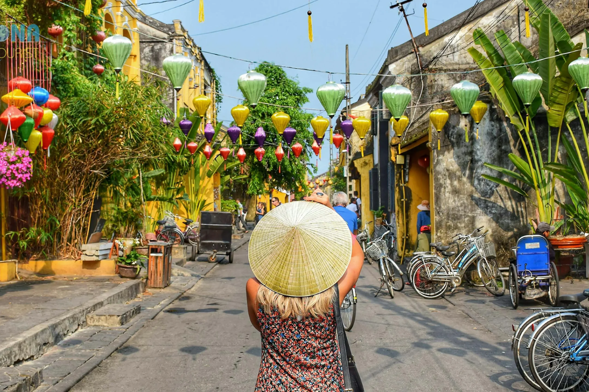 Female traveler enjoying a scenic view in Hoian